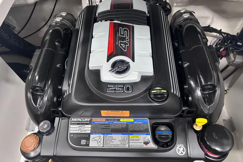Slide: The Image of 2026 Chaparral 23 SSi boat engine, featuring a Mercury 4.5L 250 horsepower motor. - 13