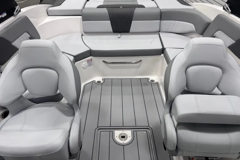 Slide: The Image of Interior of 2026 Chaparral 23 SSi boat with gray seating and flooring. - 18