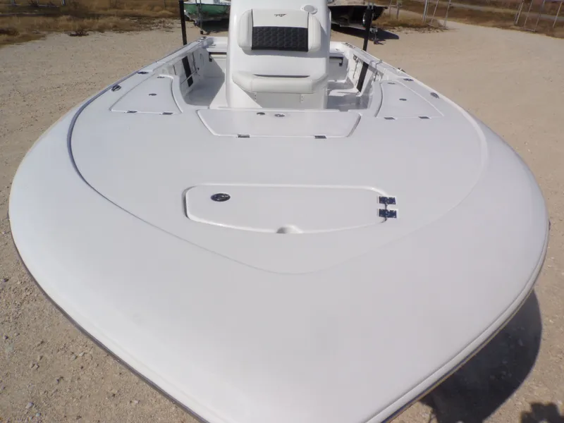 Slide: The Image of Tidewater 2110BMT 2026 boat on dry land, front view. - 11