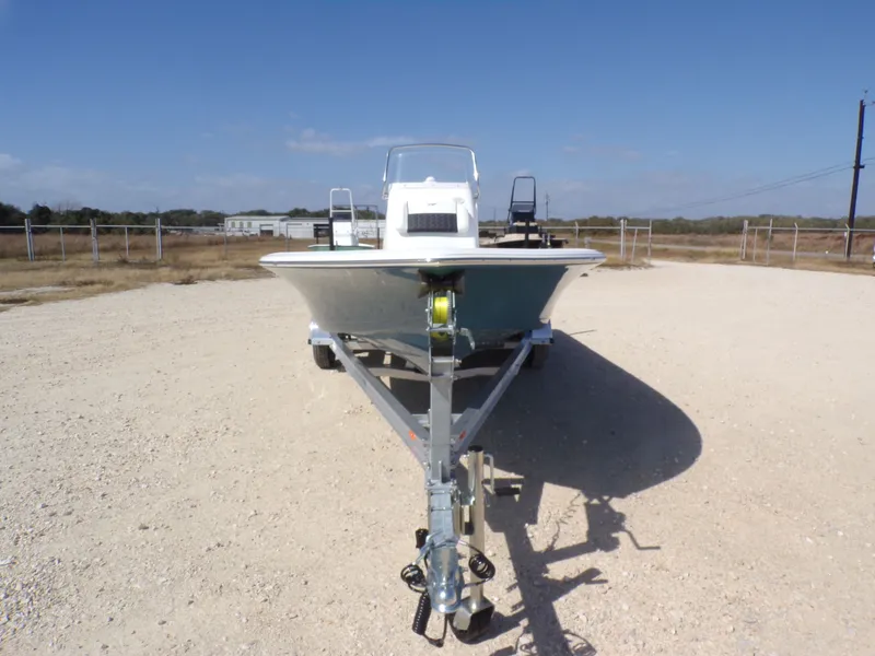 Slide: The Image of Tidewater 2110BMT 2026 boat on trailer in sunny setting. - 5