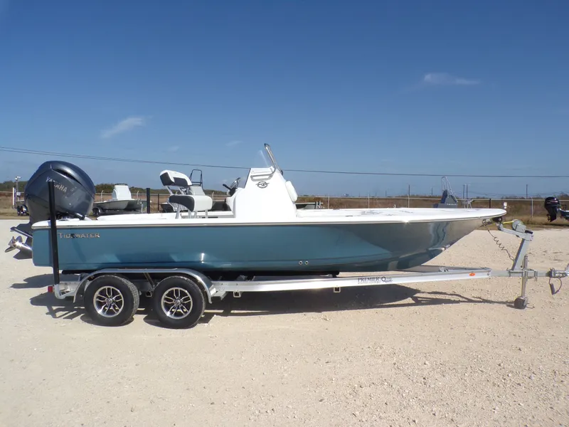 Slide: The Image of Tidewater 2110BMT 2026 on trailer, blue hull, Yamaha engine. - 7