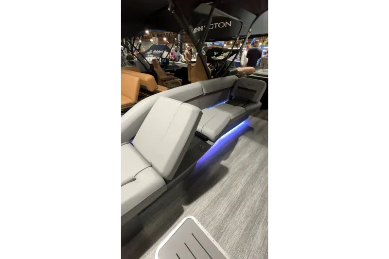 Slide: The Image of 2026 Bennington 24 M Stern Lounge with modern seating and ambient lighting. - 4