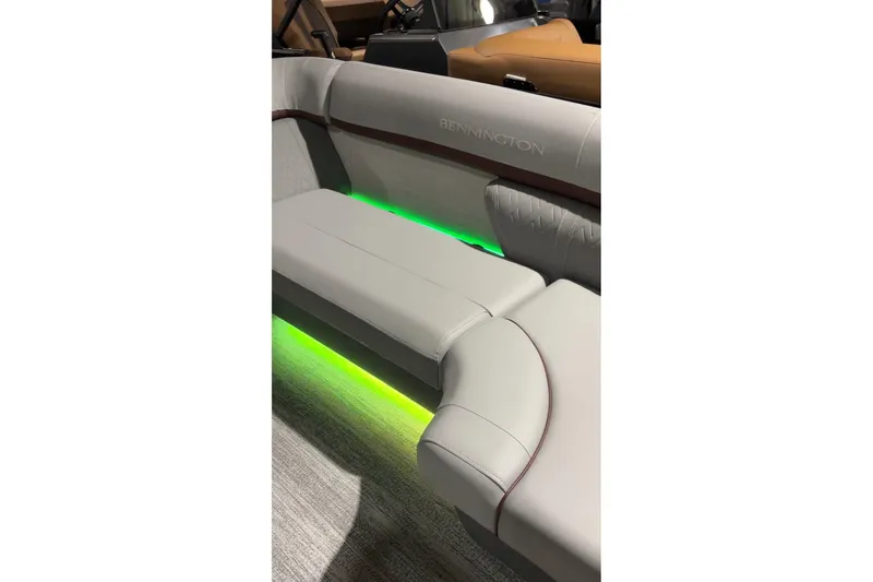 Slide: The Image of 2026 Bennington 24 M Stern Lounge with illuminated seating and modern design. - 5