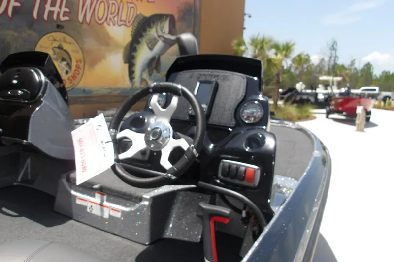 Slide: The Image of Steering console of a 2026 Nitro Z17 boat, featuring modern controls and dashboard. - 8