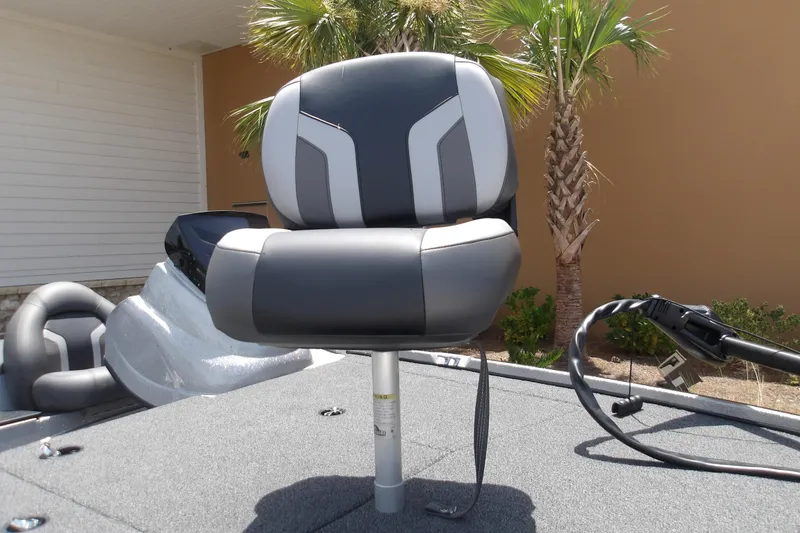 Slide: The Image of 2026 Nitro Z17 boat seat with modern design, set against a tropical backdrop. - 18