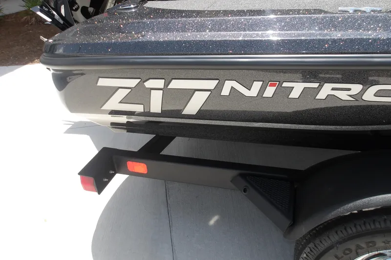 Slide: The Image of 2026 Nitro Z17 boat with sleek black finish and bold branding. - 7
