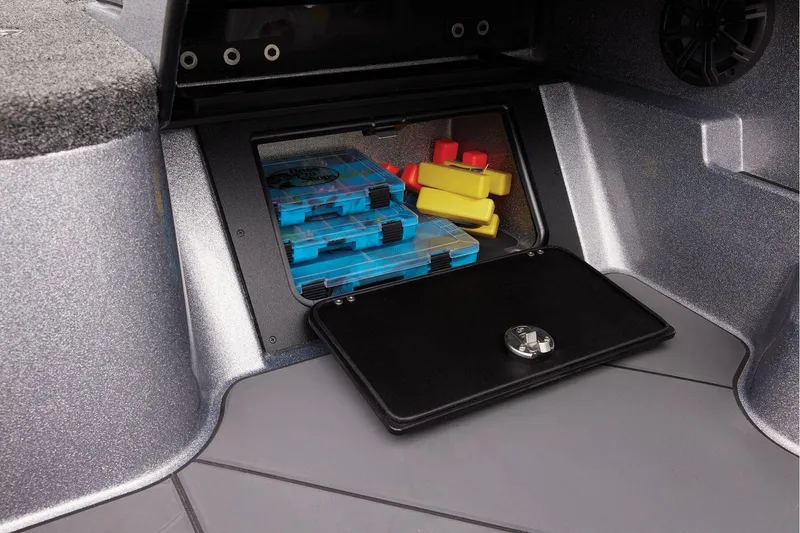 Slide: The Image of 2026 Nitro ZV20 Sport Pro boat interior with carpeted deck and storage compartments. - 37