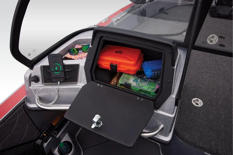 Slide: The Image of 2026 Nitro ZV20 Sport Pro boat storage compartment with open hatch and carpeted interior. - 39