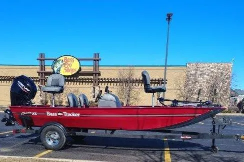 The Image of 2026 Tracker Bass Tracker Classic XL boat parked outside Bass Pro Shop. - 0