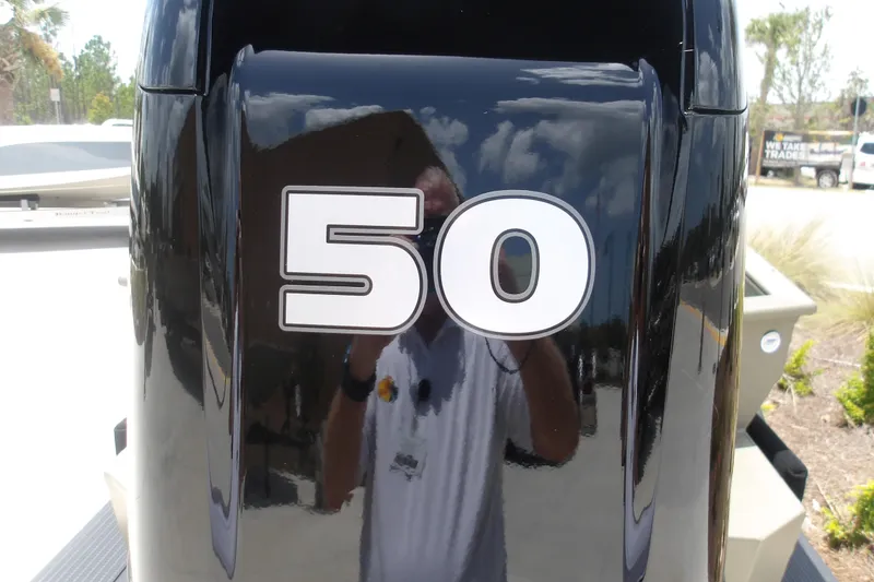 Slide: The Image of Tracker Grizzly 1650 T Prairie Wings Edition 2026, black exterior with '50' decal. - 7