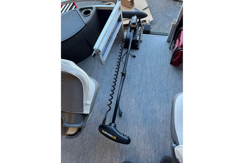 Slide: The Image of 2026 Sun Tracker Bass Buggy 18 DLX interior with Minn Kota trolling motor. - 11