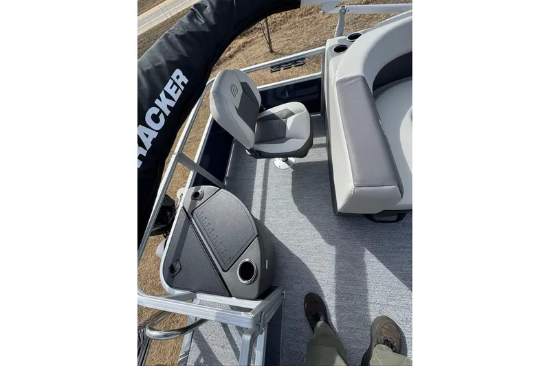 Slide: The Image of 2026 Sun Tracker Bass Buggy 18 DLX interior with seating and control panel. - 5