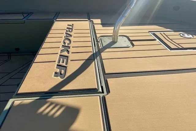 Slide: The Image of 2026 Tracker Grizzly 1756 T Marsh boat deck with logo and sleek design. - 44