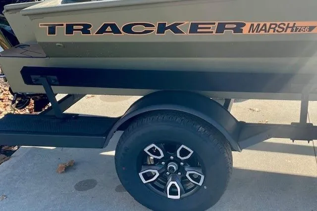 Slide: The Image of 2026 Tracker Grizzly 1756 T Marsh boat on trailer, side view. - 45