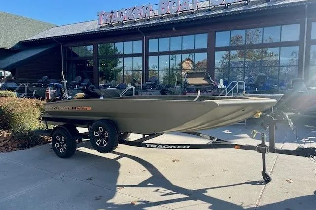 Slide: The Image of 2026 Tracker Grizzly 1756 T Marsh boat on trailer outside dealership. - 46
