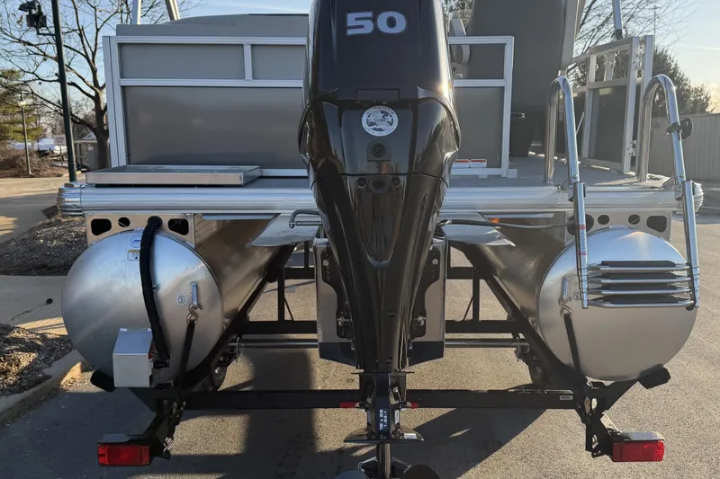 Slide: The Image of 2026 Sun Tracker Bass Buggy 16 XL Select pontoon boat with 50 HP outboard motor. - 5