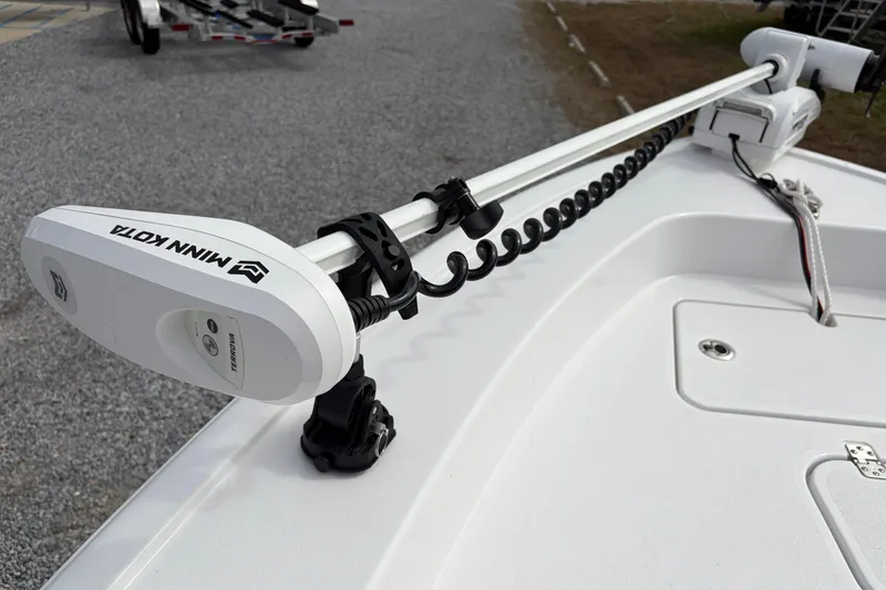 Slide: The Image of 2024 Sportsman Masters 267 Bay Boat with Minn Kota trolling motor. - 13