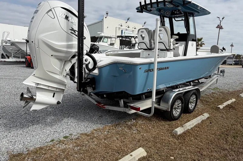 Slide: The Image of 2024 Sportsman Masters 267 Bay Boat on trailer, featuring Yamaha outboard engine. - 4