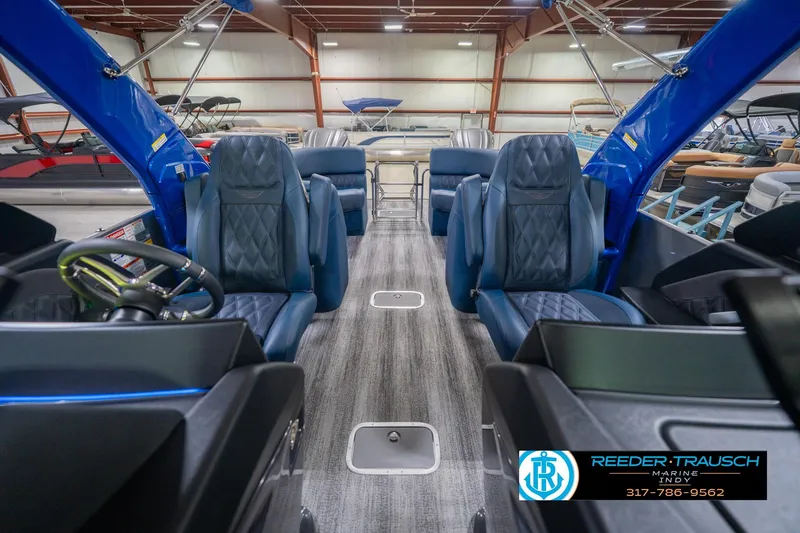 Slide: The Image of Interior of 2026 Bennington 27 RX boat with luxurious seating and modern design. - 16