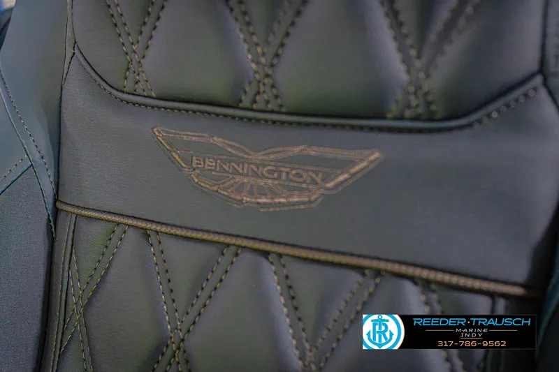 Slide: The Image of Close-up of 2026 Bennington 27 RX boat seat with logo and stitching detail. - 37