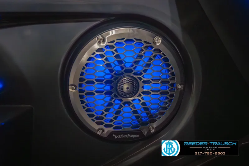 Slide: The Image of Blue LED-lit speaker on 2026 Bennington 27 RX boat, featuring Rockford Fosgate design. - 41