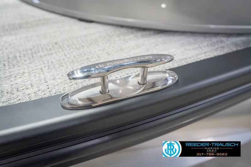 Slide: The Image of 2026 Bennington 27 RX boat cleat detail with Reeder-Trausch Marine logo. - 55
