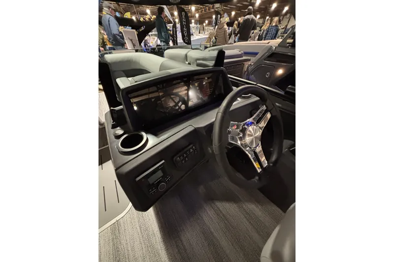 Slide: The Image of 2026 Bennington 23 SSB SF boat interior with modern steering wheel and dashboard. - 6