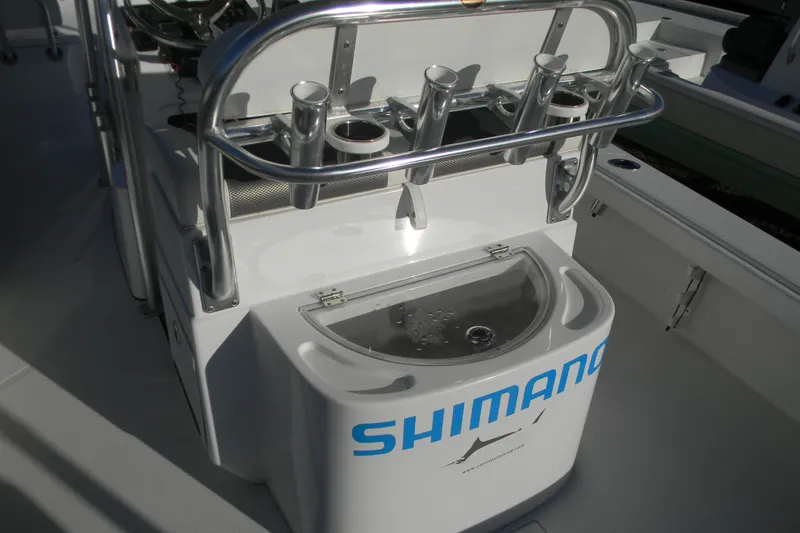 Slide: The Image of 2021 BlackJack 256 Coastal boat with Shimano fishing gear setup. - 2