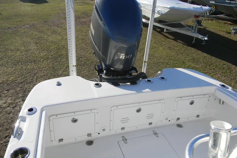 Slide: The Image of 2021 BlackJack 256 Coastal boat with Yamaha 300 engine, featuring a spacious deck layout. - 3