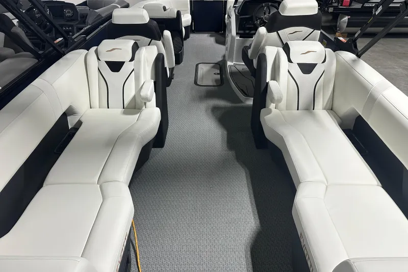 Slide: The Image of Luxurious interior of 2026 Evotti 723 QL boat with white seating and modern design. - 10