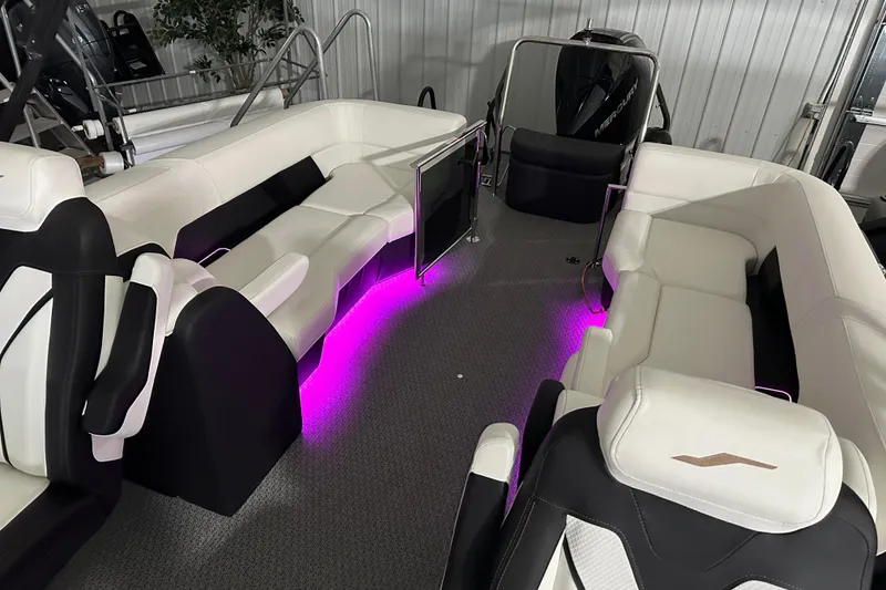 Slide: The Image of Luxurious interior of 2026 Evotti 723 QL boat with ambient purple lighting. - 18