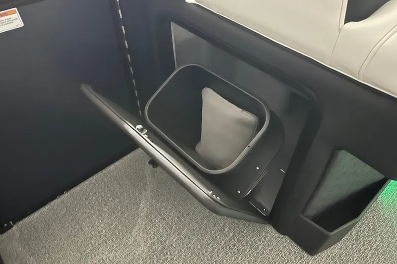 Slide: The Image of Evotti 723 QL 2026 interior storage compartment with open door and cushion inside. - 22