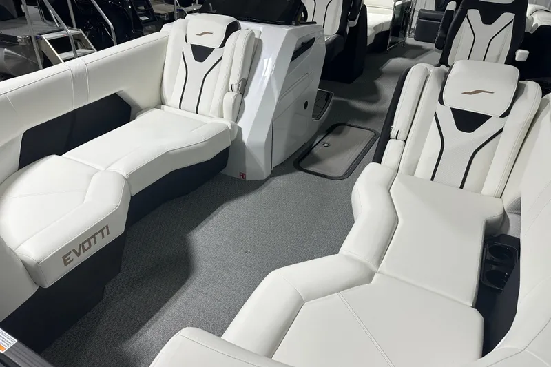 Slide: The Image of Luxurious interior of 2026 Evotti 723 QL boat with sleek white seating. - 3