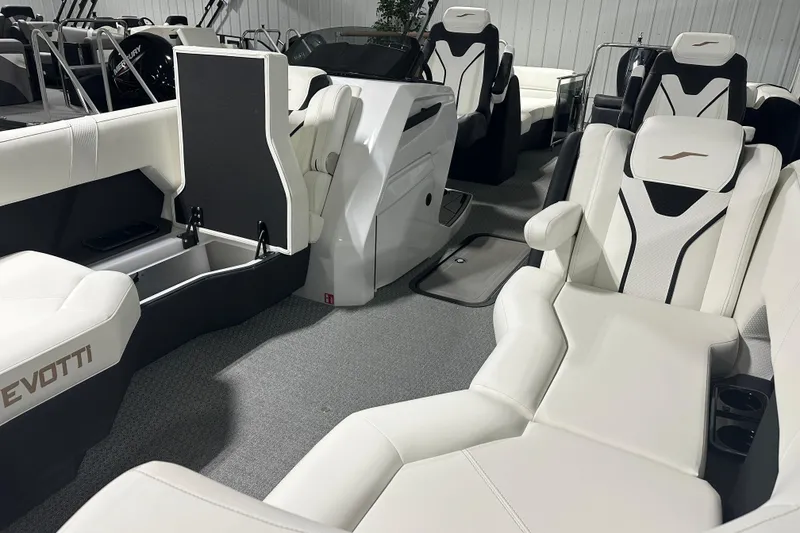 Slide: The Image of Luxurious interior of 2026 Evotti 723 QL boat with white leather seating. - 4
