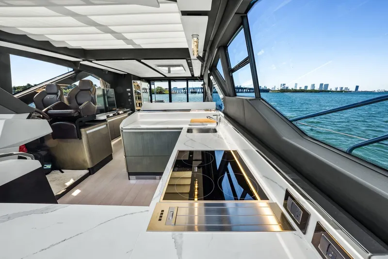 Slide: The Image of Luxurious interior of 2019 Azimut S7 yacht with modern kitchen and scenic ocean view. - 20