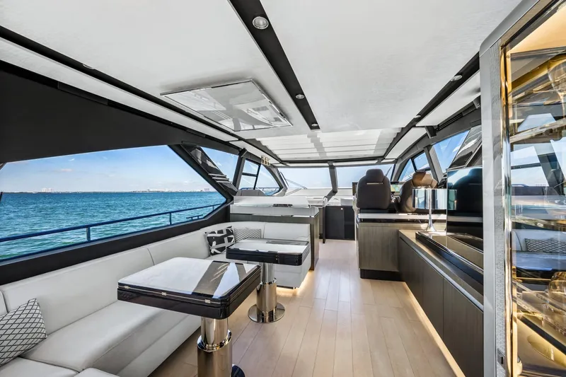 Slide: The Image of Luxurious interior of 2019 Azimut S7 yacht with modern furnishings and panoramic ocean views. - 21