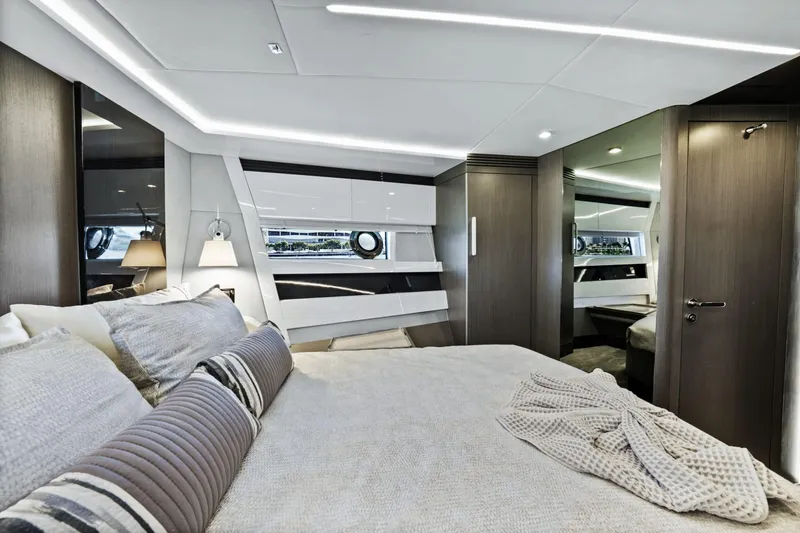 Slide: The Image of Luxurious 2019 Azimut S7 yacht bedroom with modern design and elegant decor. - 37