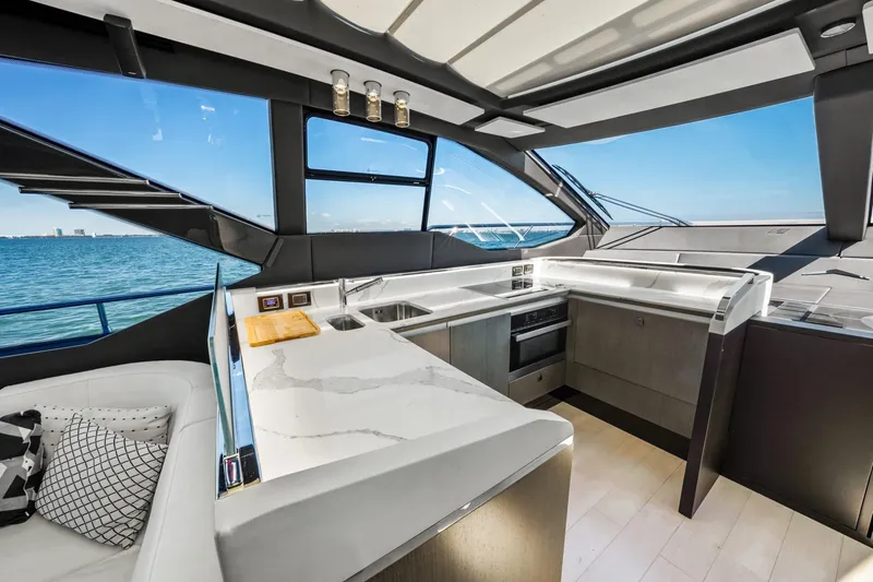 Slide: The Image of Luxurious interior of 2019 Azimut S7 yacht with modern kitchen and ocean view. - 39