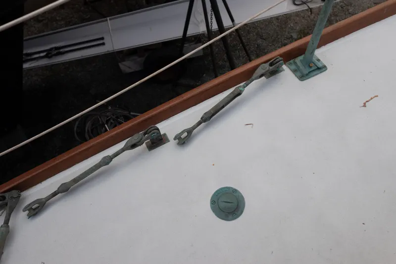 Slide: The Image of Deck fittings on a 1965 Concordia 39 sailboat, featuring rigging and hardware. - 19
