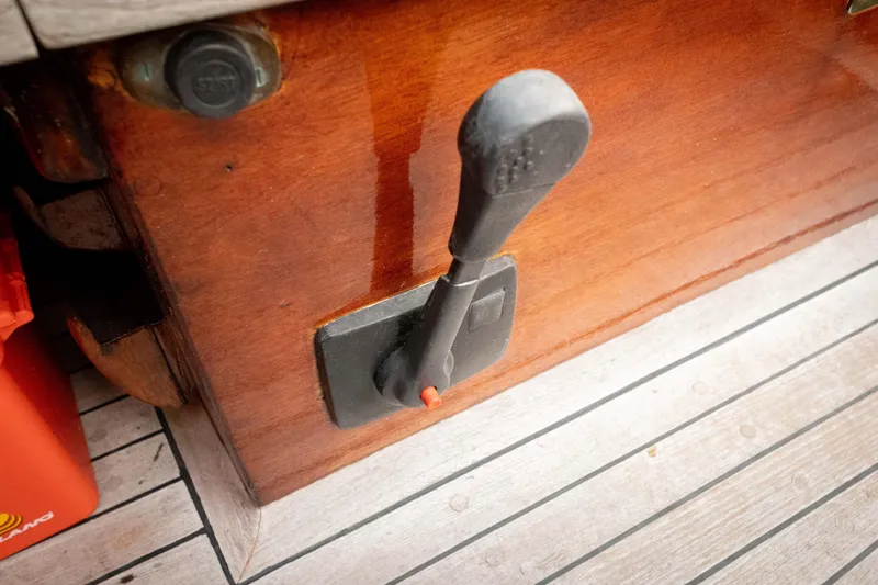 Slide: The Image of Control lever on a 1965 Concordia 39 wooden boat deck. - 22