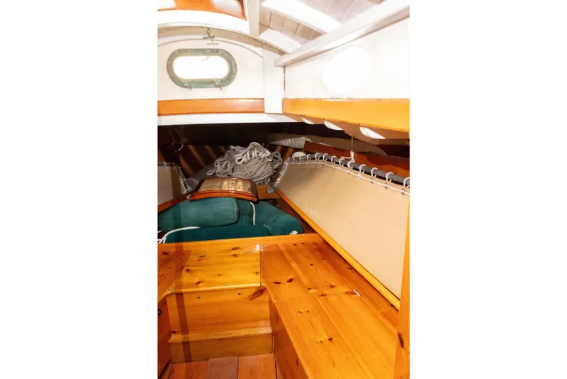 Slide: The Image of Interior of 1965 Concordia 39 sailboat with wooden finish and nautical decor. - 40