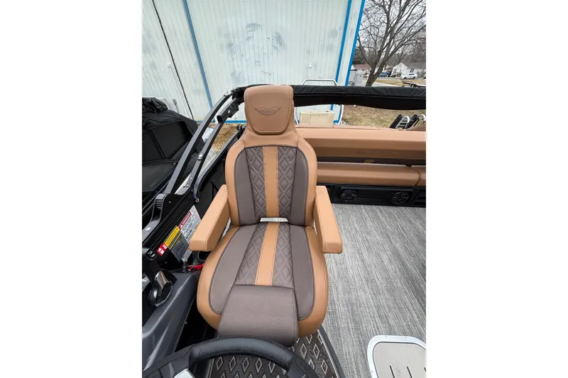 Slide: The Image of 2026 Bennington 22 M Swingback boat seat with brown and tan upholstery. - 13