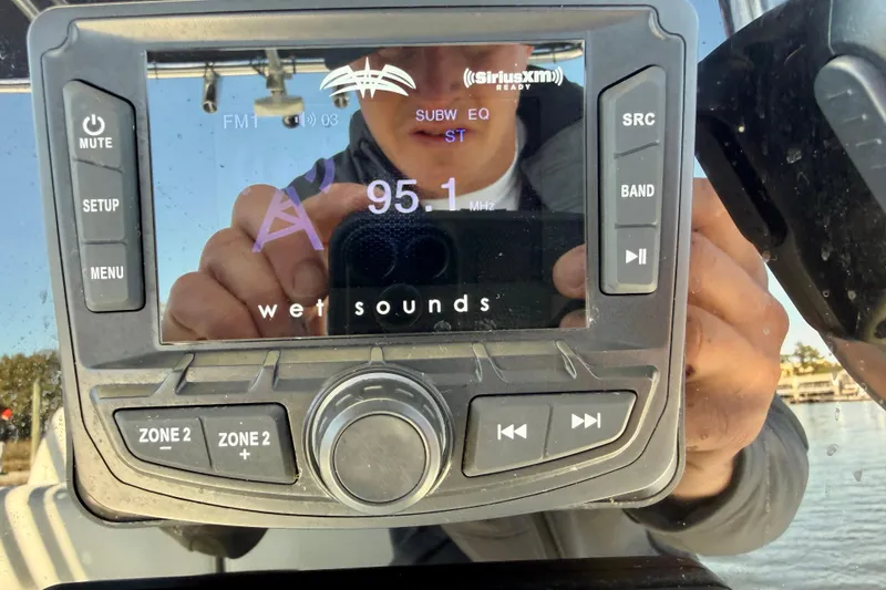 Slide: The Image of Boat stereo system displaying 95.1 FM on Parker 2100 Special Edition, 2024 model. - 10