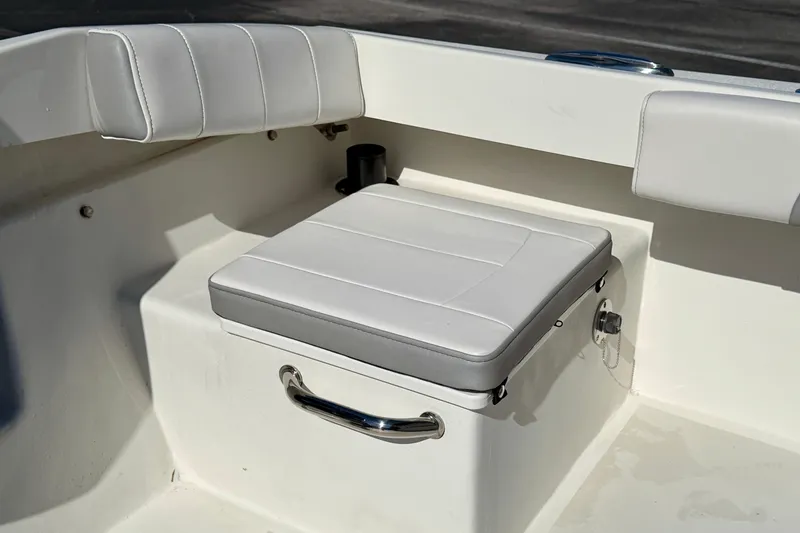Slide: The Image of 2024 Parker 2100 Special Edition boat seat with white and gray upholstery. - 20