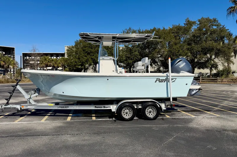 Slide: The Image of 2024 Parker 2100 Special Edition boat on trailer, parked outdoors. - 39