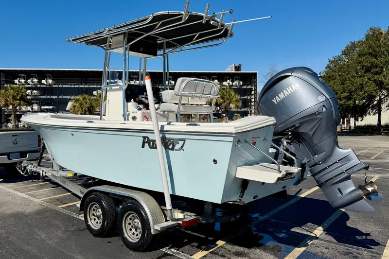 Slide: The Image of 2024 Parker 2100 Special Edition boat with Yamaha outboard motor on trailer. - 40