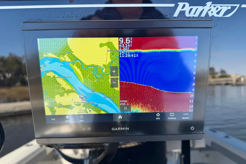 Slide: The Image of Garmin navigation display on 2024 Parker 2100 Special Edition boat, showing map and sonar data. - 9