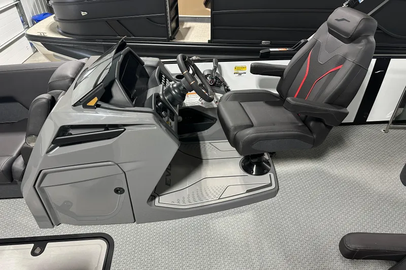 Slide: The Image of 2026 Evotti 725CS boat cockpit with modern steering and comfortable seating. - 11