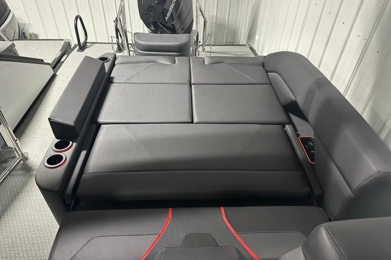 Slide: The Image of Luxurious Evotti 725CS 2026 interior with sleek black seating and red accents. - 19