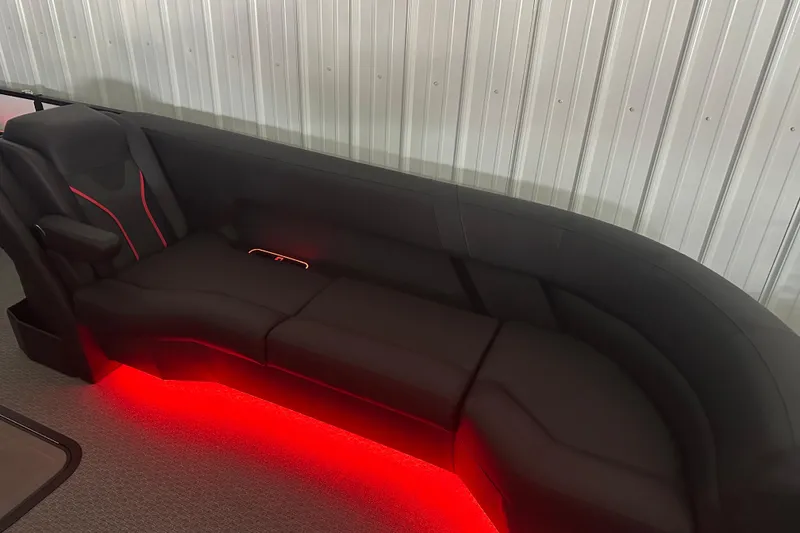 Slide: The Image of Luxurious black leather seating in Evotti 725CS, 2026 model, with integrated cup holders. - 23